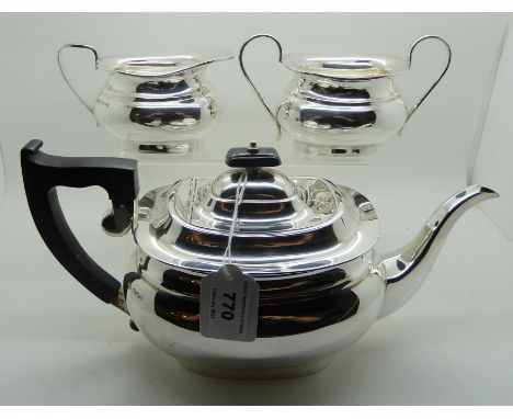 A three piece silver tea service, Sheffield 1938, 1136gms Condition Report: Not available for this lot