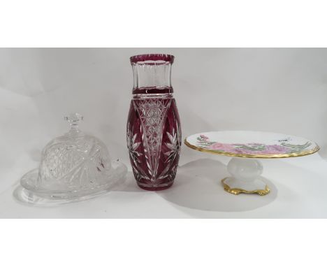 A chrysanthemum painted tazza, a cut glass cheese dish and cover and a ruby flashed and cut glass vase Condition Report: Avai