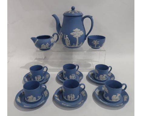 A Wedgwood blue jasperware coffee set comprising pot, milk jug, sugar bowl and six cans and saucers Condition Report: nice co