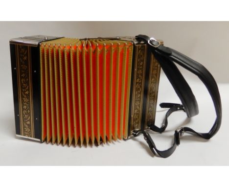 A Hofbaue Tanzbar self playing accordion with battery charger, two song cassettes and fitted case Condition Report: The instr