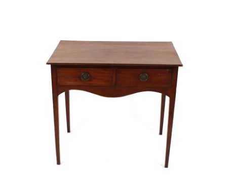 A 19th Century mahogany side table, fitted two short drawers above a shaped apron, raised on square tapering supports, 81cm w