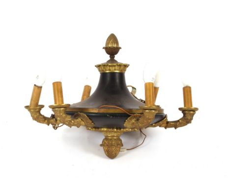A brass and Tolware style six branch chandelier,&nbsp;of Empire design