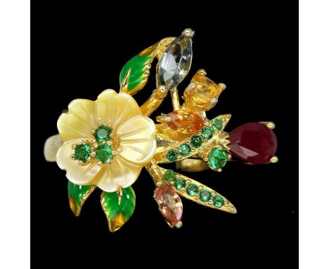 A 925 silver gilt ring set with carved mother of pearl, ruby and fancy colour sapphires, (L).