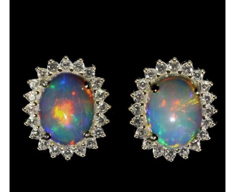 A pair of 925 silver gilt cluster earrings set with cabochon cut opal and white stones, L. 1cm.