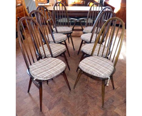 Eight Ercol dining chairs. Condition report: see terms and conditions