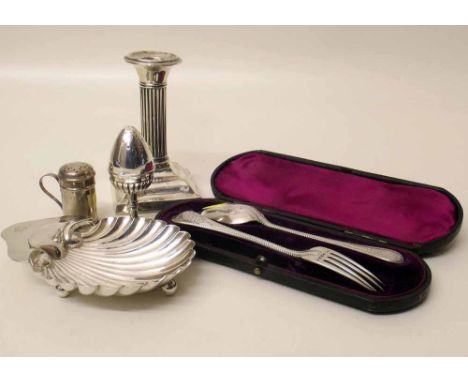 Small silver candlestick; two silver pounce pots; butter dish; cased spoon and fork. Condition report: see terms and conditio