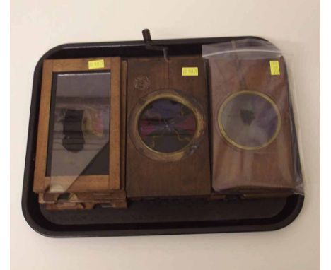 Mahogany kaleidoscope lantern slide with crank; 13 other slides with sliding glass Condition report: see terms and conditions