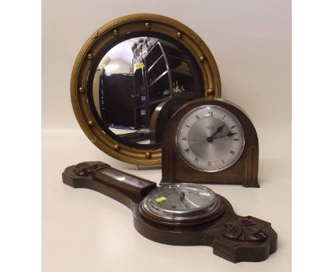 Garrard mantel clock, oak aneroid barometer and convex gilt mirror. Condition report: see terms and conditions