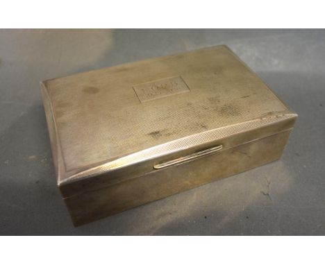 A Birmingham Silver Rectangular Cigarette Box with engine turned decoration, 10.5 by 8.5 cms 