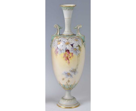 A late Victorian Royal Worcester porcelain twin handled pedestal vase, of tapering ovoid form with architectural moulded scro