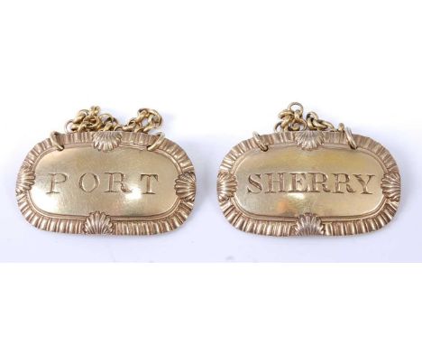 * A pair of George IV silver gilt wine labels, annotated for Sherry and Port, maker Charles Rawlings, London 1827, w.4.4cmCon