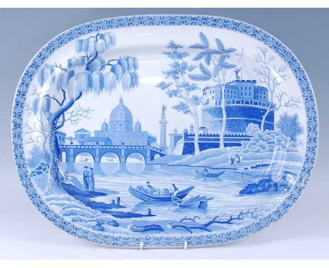 A 19th century Spode blue and white meat plate, decorated with a London Thames River Scene with St Paul's Cathedral, Nelson's