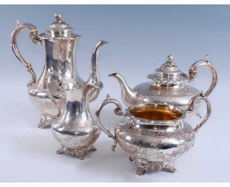 A Victorian silver four-piece tea set, comprising coffee pot, teapot, milk jug and twin handled sugar bowl, each of bulbous b