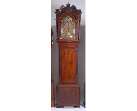 S Nixon of Newcastle - an early 19th century mahogany longcase clock, the hood having a broken swan-neck pediment and twin fl