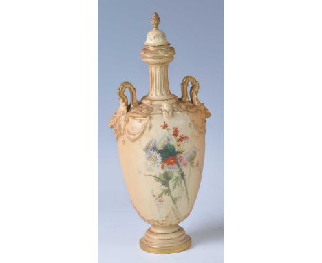 An Edwardian Royal Worcester porcelain blush ivory twin handled pedestal vase and cover, of tapering ovoid form with fluted n