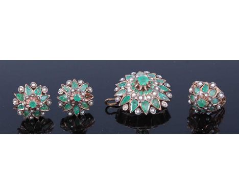 A yellow metal, emerald and pearl suite, comprising a pair of Mughal style circular cluster earrings, each having a 3.6mm rou