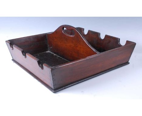* A Regency mahogany and later adapted wine bottle carrier, of square section, designed for six bottles, unusual in having fl