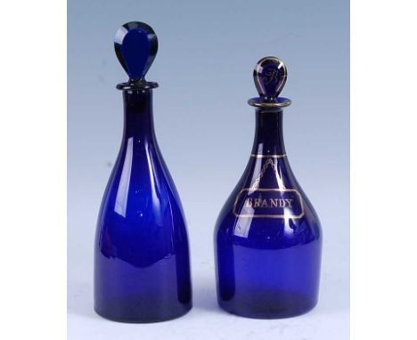 * An early 19th century Bristol blue glass decanter, the lozenge stopper above a mallet form body, with gilt decoration and a