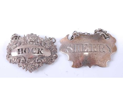 * A George IV silver wine label, of escutcheon outline and annotated for Sherry, maker John Reily, London 1822, w.5.5cm; toge
