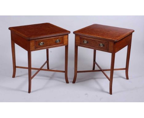 A pair of walnut and burr walnut side tables, having crossbanded tops over single frieze drawers, raised on square tapering s