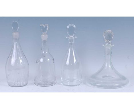 * A 19th century lead glass decanter, the lozenge stopper above a double ring neck, flat cut shoulder and mallet form body, 3