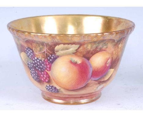 A Royal Worcester porcelain sugar bowl, decorated with fruit on a mossy bank by T Nutt, signed, printed black backstamp, mid-
