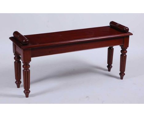 A Victorian style mahogany window seat with scroll ends, raised on Gillows type reeded supports, w.106cm, seat h.47cmConditio
