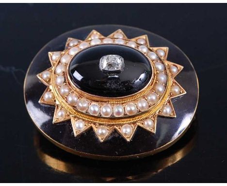 A yellow metal, pearl and diamond Victorian target style mourning brooch, featuring a centre 3.4 x 2.8mm old cushion cut diam