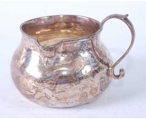 * An early George III silver brandy saucepan, having loop carry handle and plain baluster body, 3oz, maker Fuller White, Lond