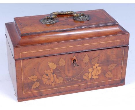 A George III mahogany, boxwood strung, satinwood and pearwood inlaid tea caddy, having a cavetto moulded top with gilt brass 