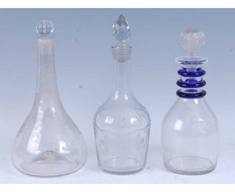 * A circa 1765 lead glass decanter, the facet cut spire stopper above a plain neck and shouldered body, with etched vine deco
