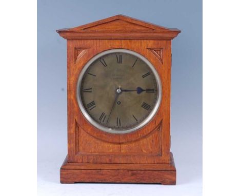 Vulliamy of London - a Victorian oak bracket clock, numbered 1314, the case of architectural outline, enclosing signed silver