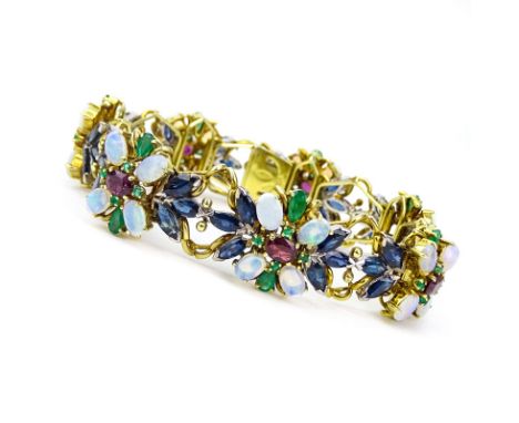 Vintage Approx. 25.0 Carat Oval Cut Sapphire, Emerald, Ruby, Opal and 18 Karat Yellow Gold Bracelet. High quality stones thro