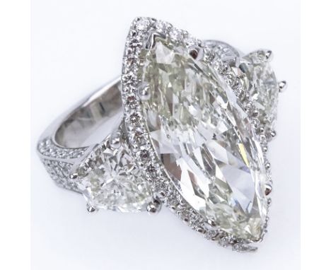Approx. 10.64 Carat TW Diamond and 14 Karat White Gold Engagement Ring Set in the Center with a 6.64 Carat Marquise Cut Diamo
