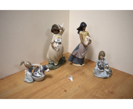 Two Lladro porcelain figure groups comprising 'Bashful Bather' number 5455, and 'Cat Nap' 5640, sold along with two larger Na