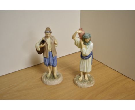Two Royal Worcester bone china Eastern Watercarrier figures, from the Hadley Collection, originally modelled by James Hadley 