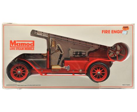 A Mamod live steam Fire Engine (FE1). In bright red with brass detailing and silver coloured ladder, plated bonnet etc. Overa