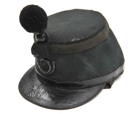 An officer’s 1861 (Quilted) pattern shako of The Rifle Brigade, rifle green cloth, black PL peak, headband and chinstrap, lac