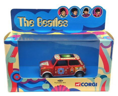 A limited issue Corgi “The Beetles” Psychedelic Mini. Made in 2000, in red covered with colourful decals, example with apple 