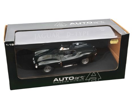 Autoart 1:18 scale Jaguar D Type Short Nose. In British Racing Green with black seats and alloy cockpit, hinged bonnet to rev