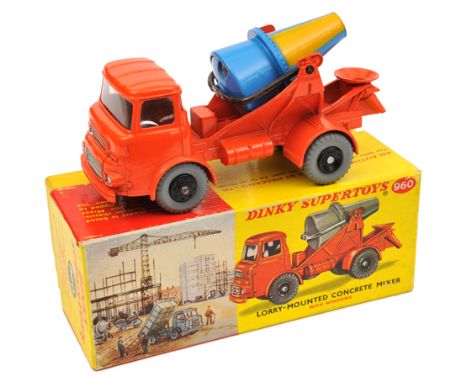 A Dinky Supertoys Albion Lorry Mounted Concrete Mixer (960). In orange with light blue and yellow cement drum, late example w