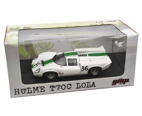 gmp 1:18 scale Lola T70C. In white with green racing stripe, RN 36, opening rear engine cover to reveal V8 engine, gearbox an