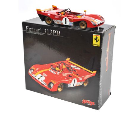 gmp 1:18 scale limited edition Ferrari 312PB. In Italian racing red with yellow flash, rear spoiler and mirror, RN1. Lift off