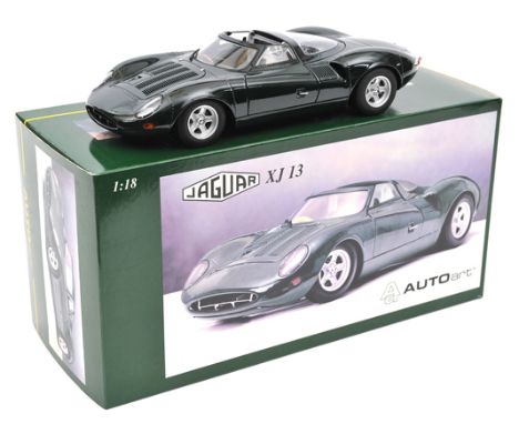 Autoart 1:18 scale Jaguar XJ13. In British Racing Green with black seats and alloy cockpit, clear engine cover which reveals 