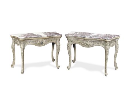 A pair of Italian silvered and painted console tables18th century, possibly SicilyThe serpentine breche violette marble tops 
