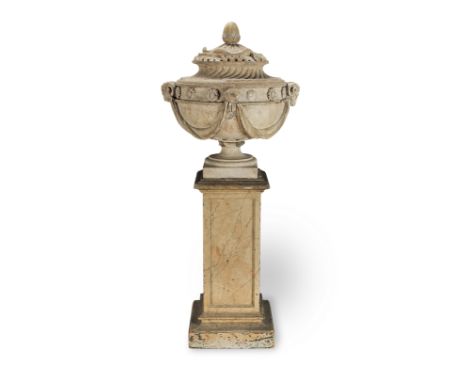 A COADE STONE URN AND COVERBy Coade &amp; Sealy, early 19th centuryThe cover and finial later, the urn including some later p
