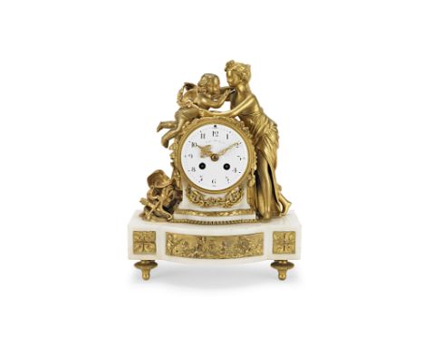 A Louis XVI style ormolu-mounted white marble mantel clockThe dial signed Tiffany &amp; Co.With Flora and cupid surrounding t