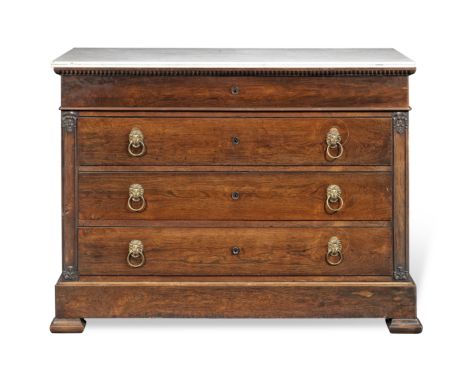 A French 19th century Rosewood commodeThe rectangular marble top above four drawers, flanked by pilasters on ogee bracket fee
