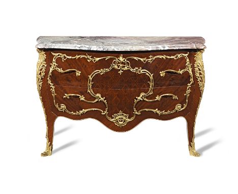 A Louis XV style ormolu-mounted kingwood and marquetry commodeRetailed by Maison Bailly, circa 1900The shaped marble top abov