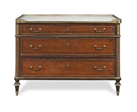 A Directoire mahogany and gilt brass mounted commodeLate 18th / early 19th century The rectangular white marble top within a 